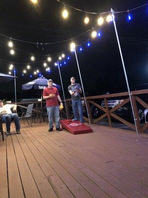 Nice ambiance and cornhole