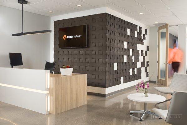 Technology company Pure Storage asked INTERPRISE to design their new location to be bright & open, integrating their brand colors.