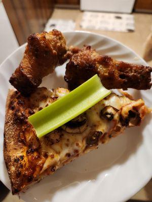 Wings, mushroom and chicken pizza slice, and celery.