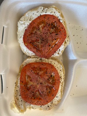 Onion bagel, cream cheese, tomato and crushed pepper!