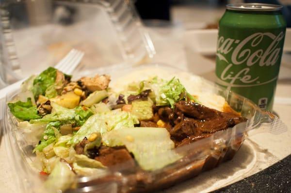 BBQ flank steak with chicken salad and mashed potatoes