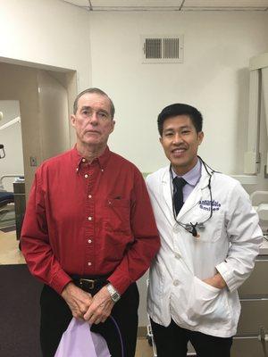 Dr. Michael with a patient on our recent Veterans Dental Day where any Vet receives a free cleaning, extraction or filling