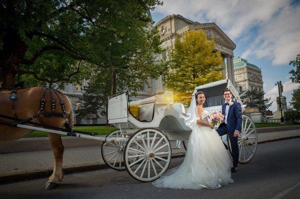 The wedding dress Tina hemmed and bustled (every single layer of tulle had to be altered) and she also altered the tuxedo my husband wore.