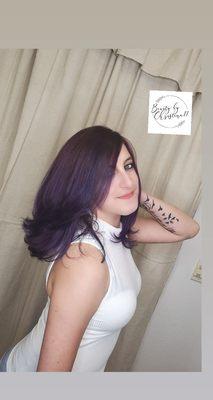 Vibrant purple and blue color and haircut