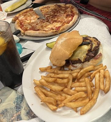 Cheeseburger, fries and a personal size pizza.