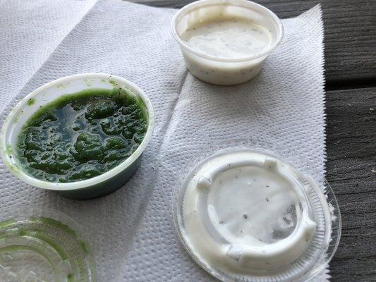 The delicious White sauce and spicy green chili sauce