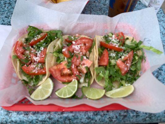 Grilled Mahi Mahi fish tacos. Gluten free and I requested lettuce, tomatoes and fresh cilantro