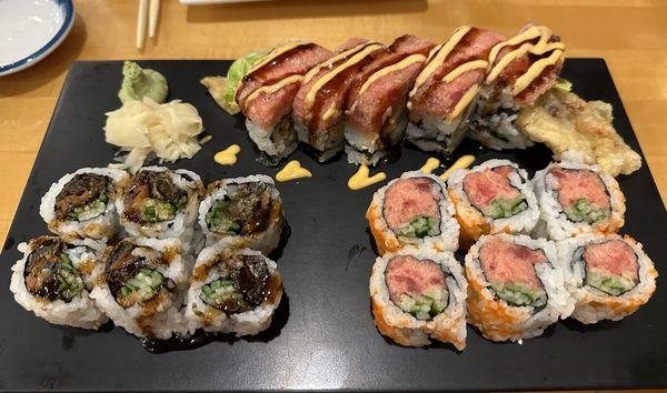 Salmon skin roll, spicy tuna roll, and spider web roll