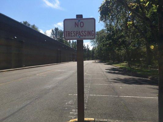 A "No Trespassing" sign leading to the primary park access point. Not a good sign. I and several other walkers ignored it.