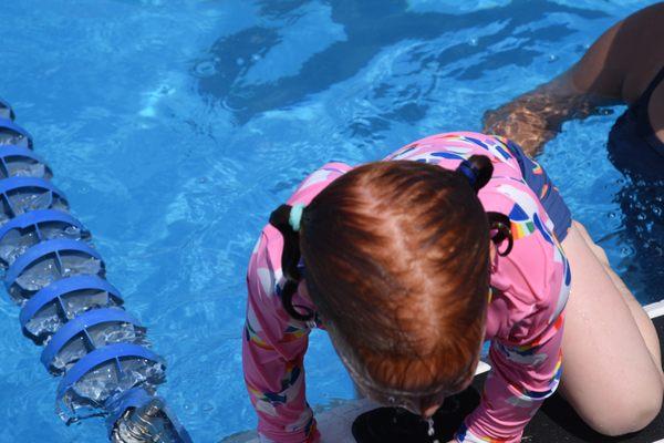 4 years old in this photo last summer. She swims like a fish. Loves Silton Swim School and will be attending again.