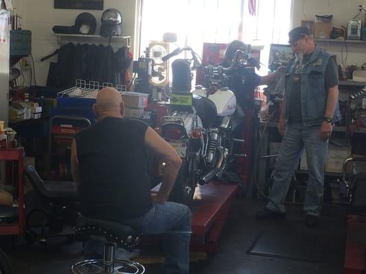 Here they are working on my Shovelhead.  Joe my mechanic is hiding here somewhere.