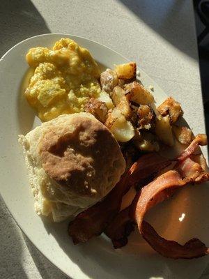 traditional southern breakfast 10.50 with scrambled eggs with cheese, biscuits, homefries, bacon