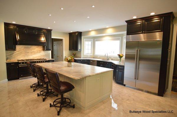 Brown Fantasy Leather finish counters with full height backsplashes...Thanks for the pictures Bullseye wood...!