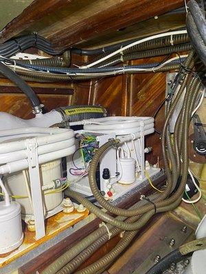 Tight squeeze to access the equipment below deck but we were able to diagnose a defective compressor on this boat.