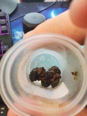 moon rocks that are white in the picture and black when they arrived