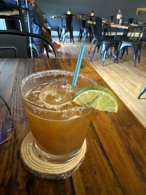 Maine squeeze: illegal mezcal, pineapple, chile liquor, lime, with a spicy rim. Sweet Smokey and little heat. It's an amazing flavor.