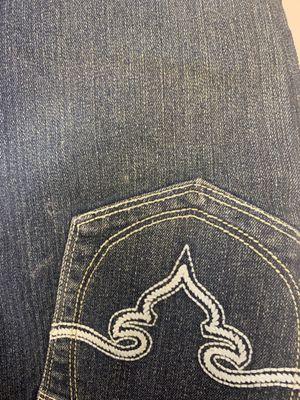 Left brown stain on jeans! This is their third attempt at getting this right!