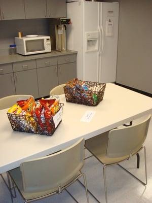 A variety of coffees and teas are served up daily at no cost in our break room and snacks are available for purchase.