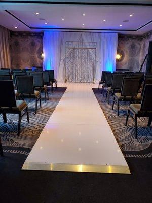 La Vie Event Rentals is at Van Zandt Hotel, Austin. Featuring our candle wall and glossy isle flooring.