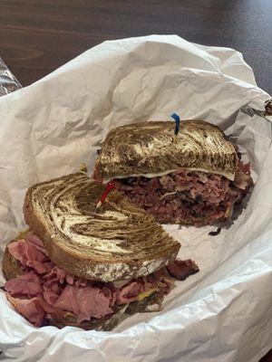 New York combo. Warm corn beef and pastrami with Swiss.