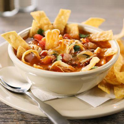 Jim's Award-Winning Tortilla Soup - A favorite for many years, our tortilla soup is based in a spicy broth and filled to the brim.