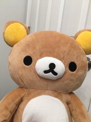 A Rilakkuma plushie that was purchased at this store.