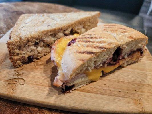 Turkey & gouda on cranberry bagel, & cranberry chicken salad on 9 grain.