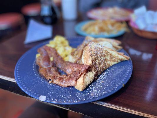 222: scrambled eggs, bacon, French toast