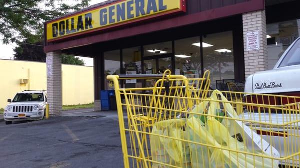 Cart full of cat food. The white SUV is creeping me out. *Stop watching me freak*