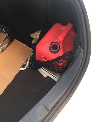 My trunk was a mess - not sure why they messed with the spare gas tank?