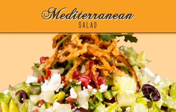 Mediterranean Salad: Chopped Romaine, Cucumbers, Tomatoes, Olives, Crispy Onions, Feta, on a Bed of Lemon-Scented Hummus