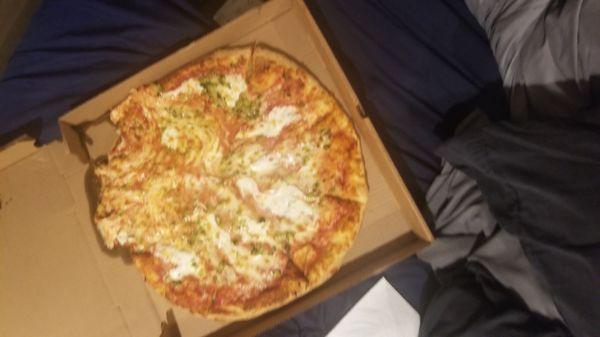 Pizza thrown out of car onto drive way