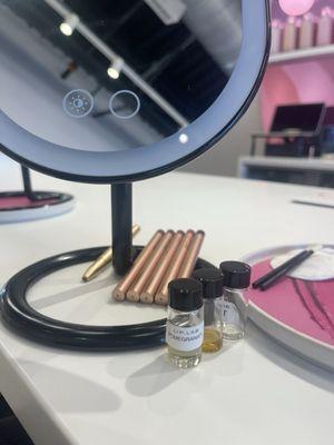 The setup, some of the scents you can add to your lipsticks, the lip liners and mirror to check out your shades.