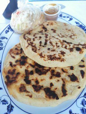 Pupusas de chicharrón and cheese.