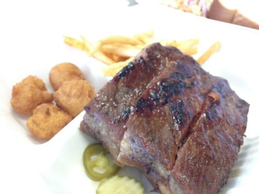 Rib Platter with sides of Hush Puppies and Fries