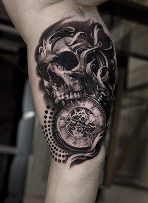 Mikhail Anderson skull clock tattoo