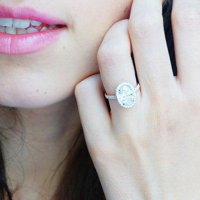 oval cut halo engagement ring