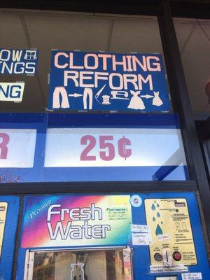 Water store-clothing alteration combo. Weird mix!