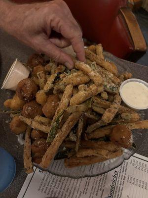 Fried veggie combo, which is mushroom zucchini, and cauliflower