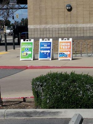 Signs outside the DMV.