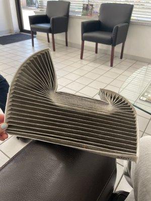 The air filter was shoved during my maintenance to "prevent" costly repairs. Will be going to my regular at River Oaks.