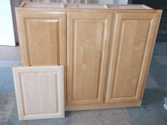 Maple cabinet with clear finish.