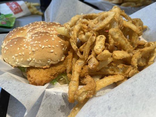 Fish Sandwich with onion rings and fries