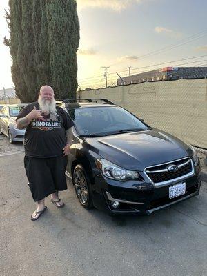 Me loving my "new" Suburu Impreza