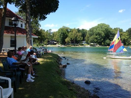 Adults may participate in optional programming or just relax by the lake.