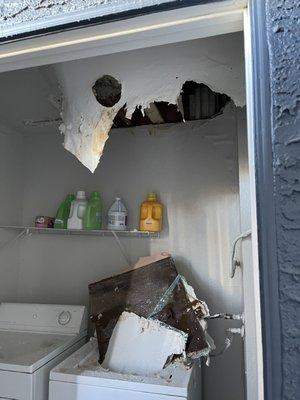 Damaged laundry room that was like this for 2 months and no reimbursement for laundry expenses.