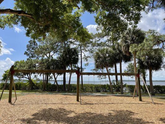 Kids playgrounds w swings, R E Olds Waterfront Park, Oldsmar, by Westchase, Tampa Bay