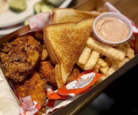 Hot chicken tenders - the spice starts out slow and builds over time, but it's definitely manageable