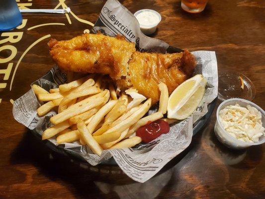 Beer battered fish fry with french fries and coleslaw