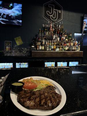 New york steak plate with rice and beans